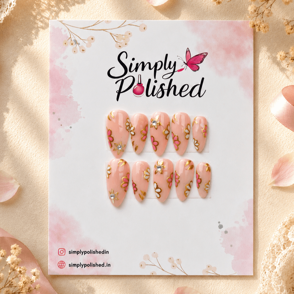Handcrafted press-on nails with delicate floral art and a glossy finish.