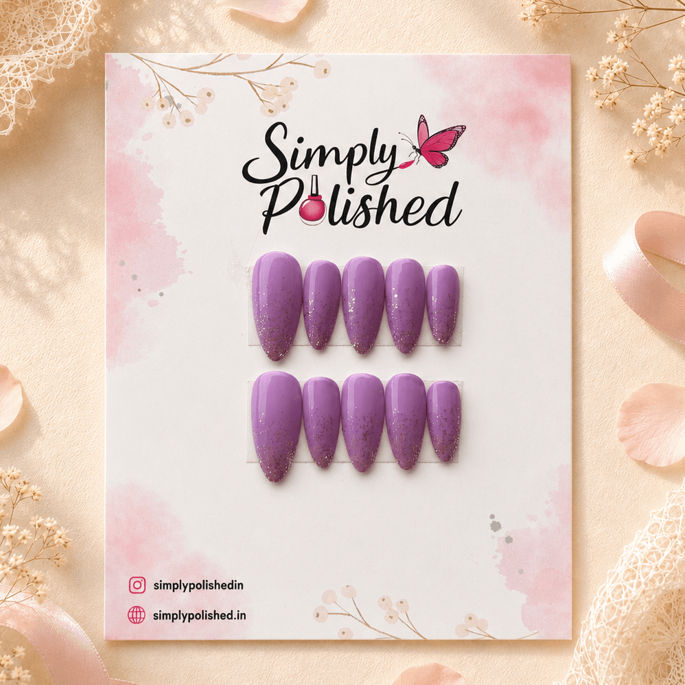 Handcrafted press-on nails with lavender purple sparkle and a glossy finish.